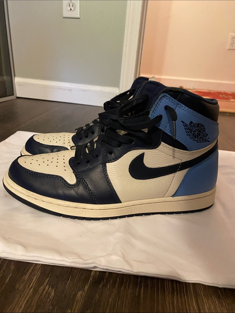Nike Air Jordan 1 Mid Navy, Light Blue, and White Sneakers